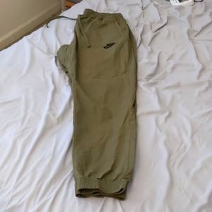Green Nike jogger pants